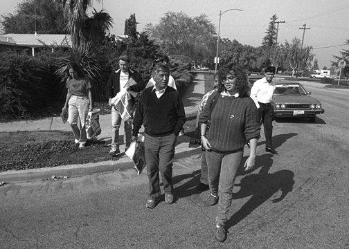 Going door to door talking to supporters about the grape boycott with Cesar, Dolores & Martin Sheen